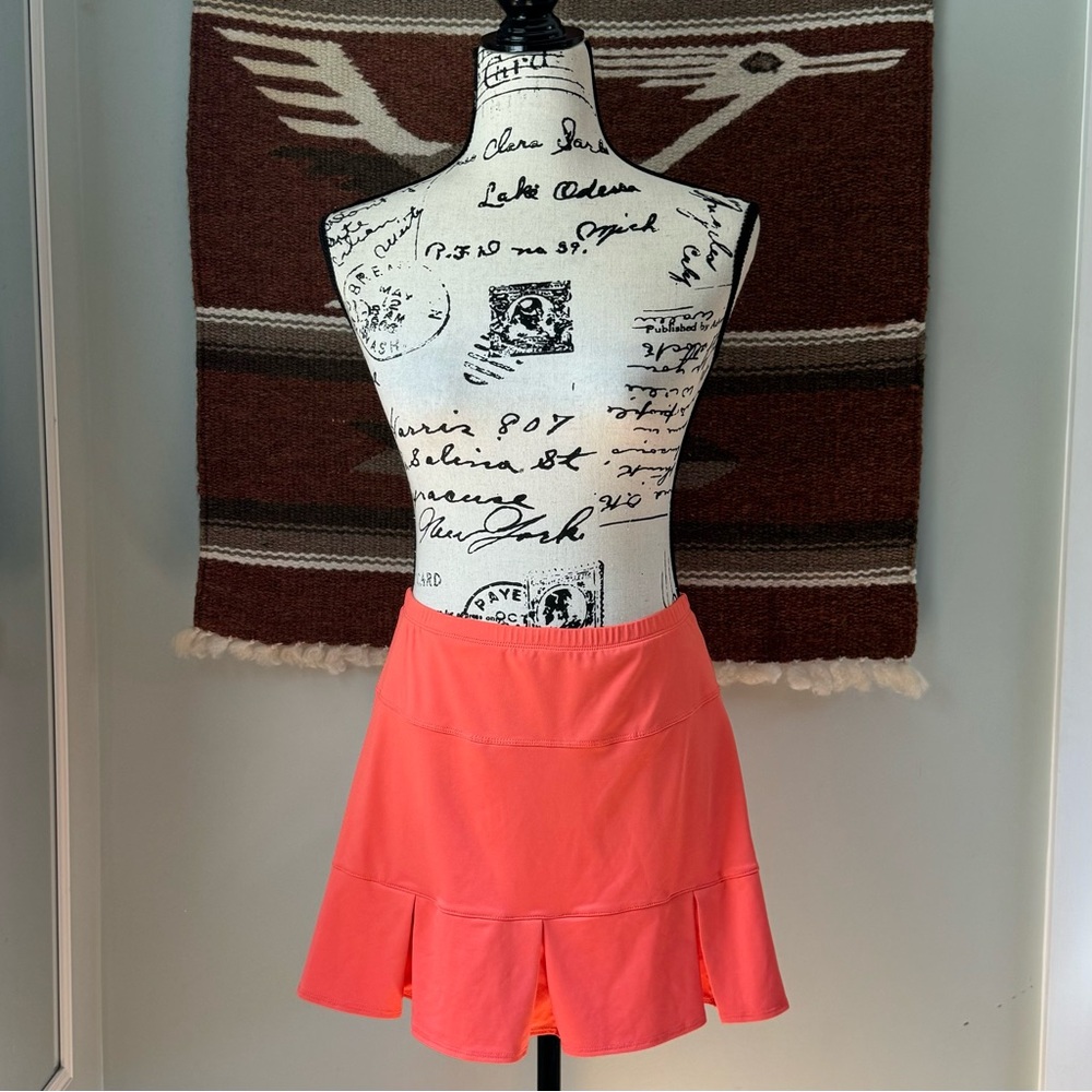 TAIL Active Doral Tennis Skort in Coral